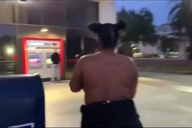 Black woman big boobs topless in public ATM