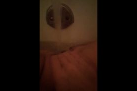 Horny wife masturbating in the bath