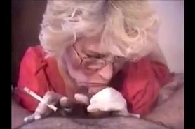 Very hot granny with glasses smoking while sucking dick