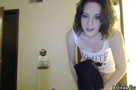 A girl shows her clothes front the webcam