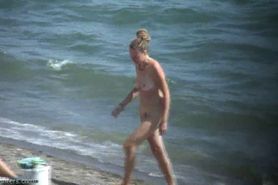 Busty Blonde walking nude on Beach