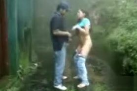 Couple fucks outdoors on a stormy day
