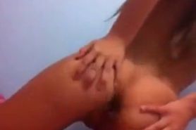 Young teen plays with tight pussy on webcam