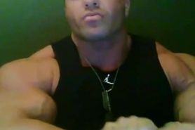 Bodybuilder flexing in tank tops and then in a tight shirt, almost ripping