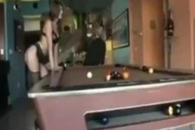 Tori black on a pool table