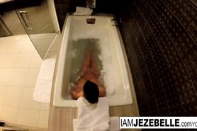 Jezebelle Bond films herself taking a bath