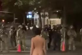 Naked Female Protester In Portland Faces Armed Police. Naked Athena She's Called.