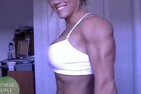 Muscle girl Cindy Phillips posing and flexing her ripped body on webcam