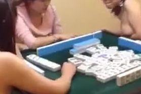 Asian girls playing strip dice game