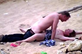Couples make love on the beach not knowing about voyeur