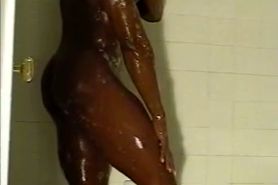 Black Female Bodybuilder taking a shower 3