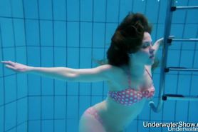 Sexy girl shows magnificent young body underwater