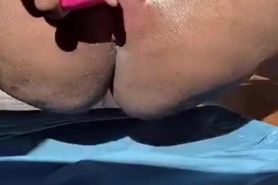 Ebony masturbating with pink dual vibrator
