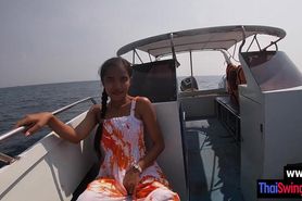 Perverted Asian teen fucked on the boat by a perverted white best friend