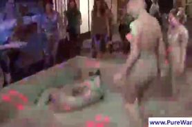 Dirty chicks fight in mud at a party