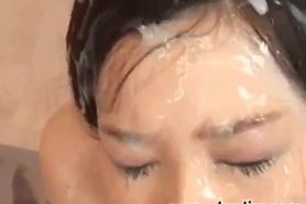 Asian minx gets facialized - video 1
