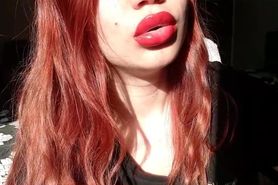 Big red glossy lips with sucking on cigarette and close up smoking