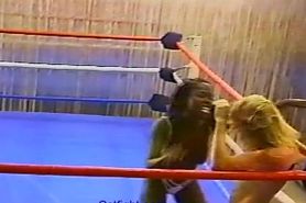 catfight Topless interracial pro style wrestling with body slams flips drop kicks scissors kicks knees