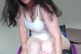 Paraplegic trying on stockings preview