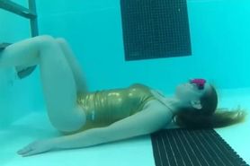 Girl Underwater Breath Holding in Pool