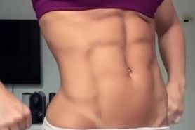 Young fitness girl Raissa Rafaelli showing her sexy abs
