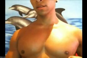 Young Muscle Hunk plays with his hot and suckable pecs and nipples