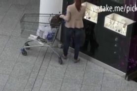 Redhead chick shows her tits at the mall before she rides dick