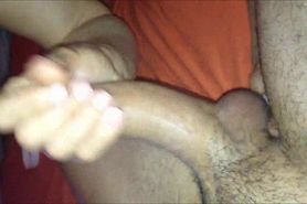 Stroking cock fingering his ass