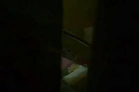 Cute brunette caught masturbating by a window peeper