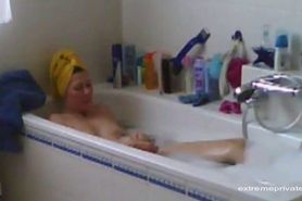 mom masturbates in bath