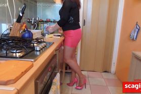 Dishwashing in pink skirt and high heels