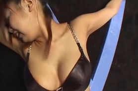 Pretty Asian bound to wooden cross fucked rough with vibrating sex toy