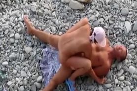 Fucked from behind in rocky beach