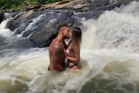 Outdoor waterfall makeout session