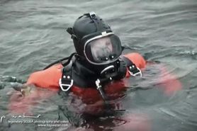 Sexy scuba girl in viking drysuits and mask 2