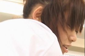 Shy Japanese girl in college giving footjob in classroom