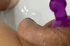 Relaxing mastrubation in bath with anal plug