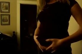Stuffed & Pregnant Girl Tires on a Tight Shirt