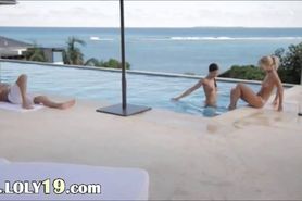 attractive threesome by the pool