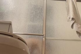 Korean college girl in the shower (cam under door)
