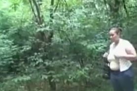 jacking off in a forrest by busty lady and she ...