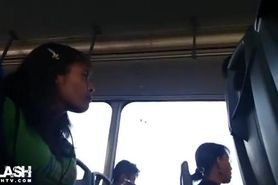 next to girl in bus