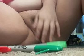 Chubby teen fucks herself with markers