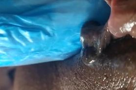 Ebony fucking her creamy pussy and rubbing her clit with a homemade dildo cumming