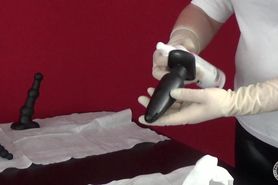 Preparing Anal Session with white rubber gloves