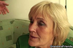 Very old blonde grandmother swallows two cocks