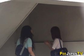 Asian students watersports pissing