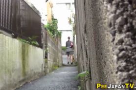 Asian watched pissing