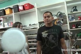 Cute couple plays sex games for cash in a store