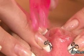Cuddly girl is gaping soft vagina in close up and cumming
